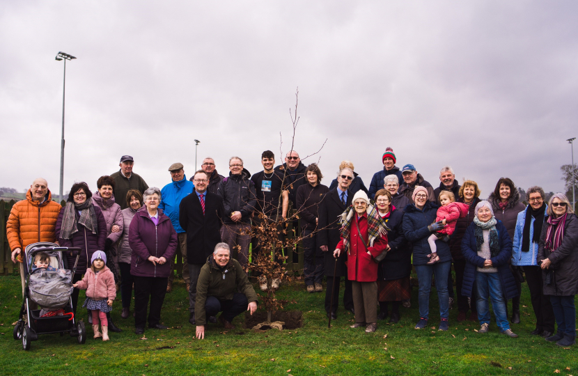 Picture of Russell George and Ian Harrison with the community at tree planting event in Guilsfield.