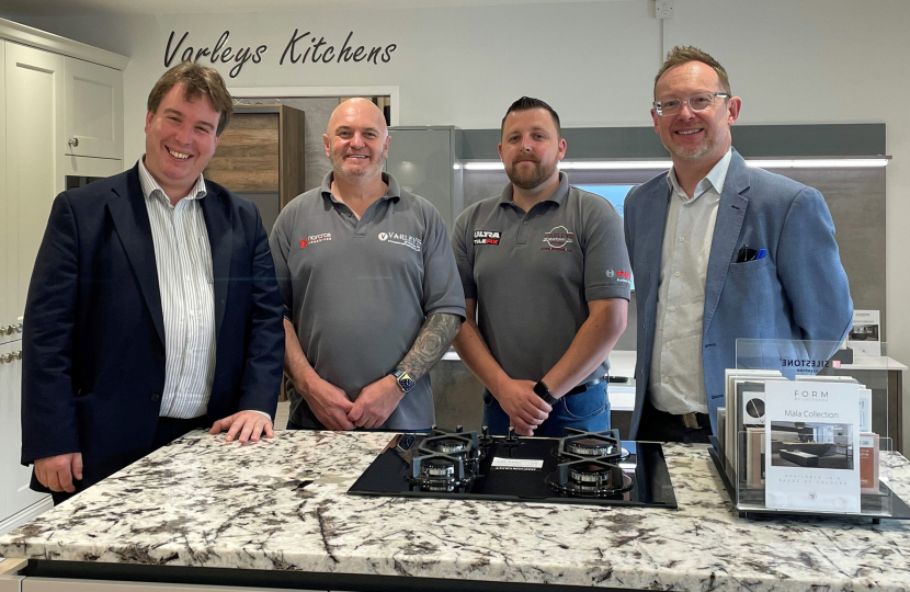 Montgomeryshire MP Craig Williams (left) and MS Russell George (right) with Joe Varley and his assistant Carl Williams in the new LochAnna kitchens showroom at the Varleys of Newtown on Saturday.