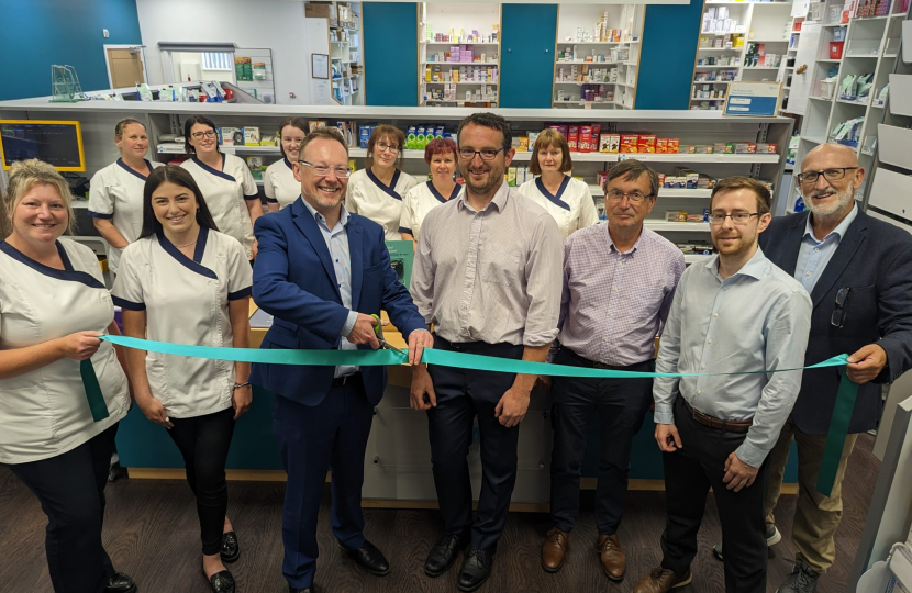 Russell George opening the pharmacy after its refurbishment 
